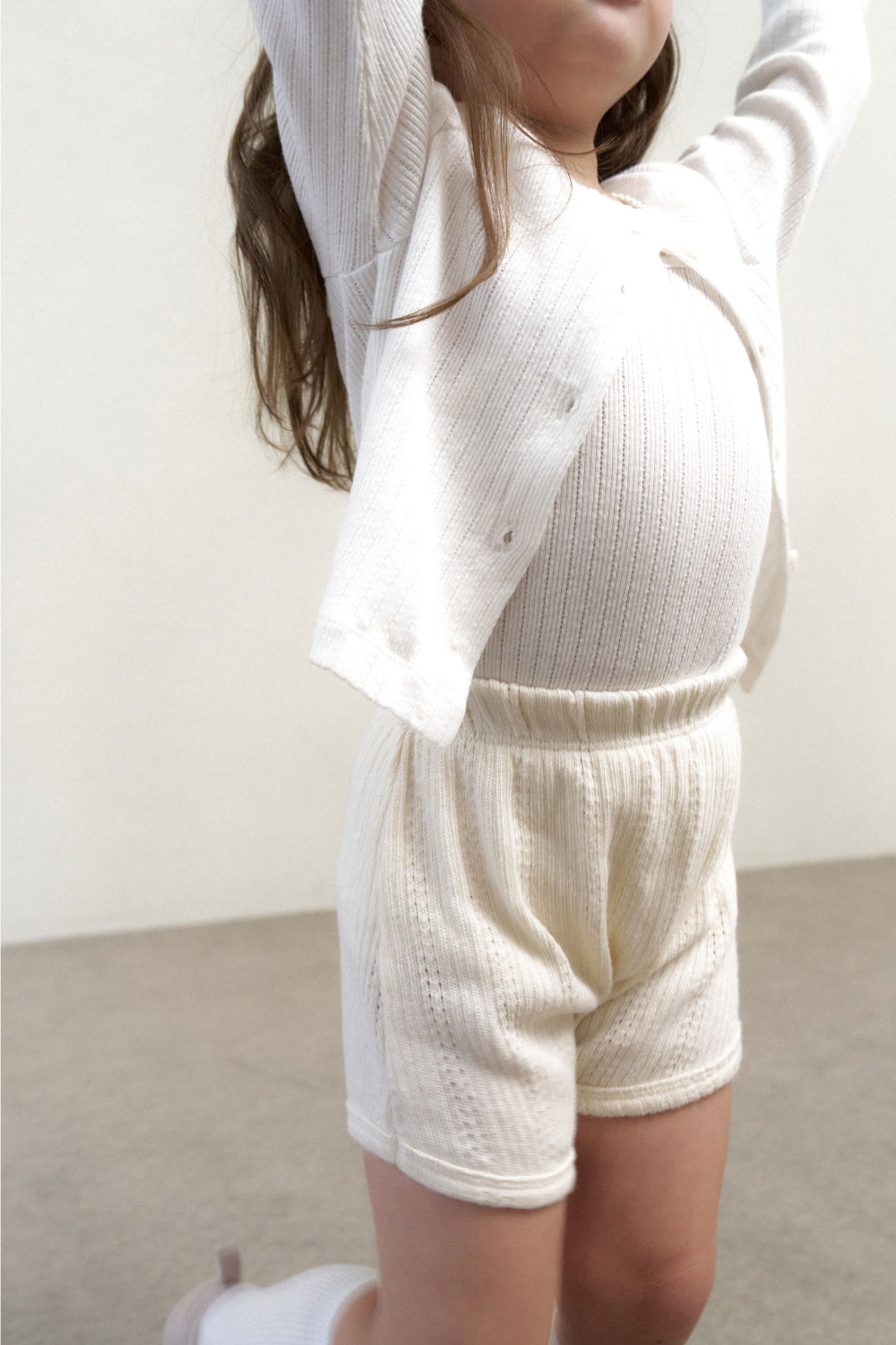 Eyelet pico cardigan